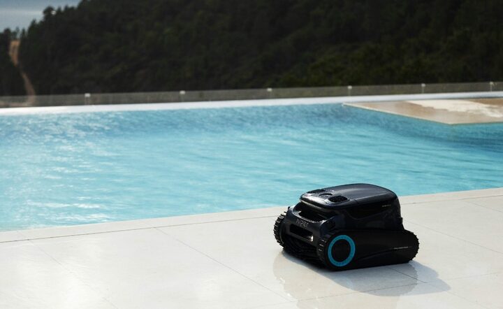Autonomous cleaning robot on a pool deck
